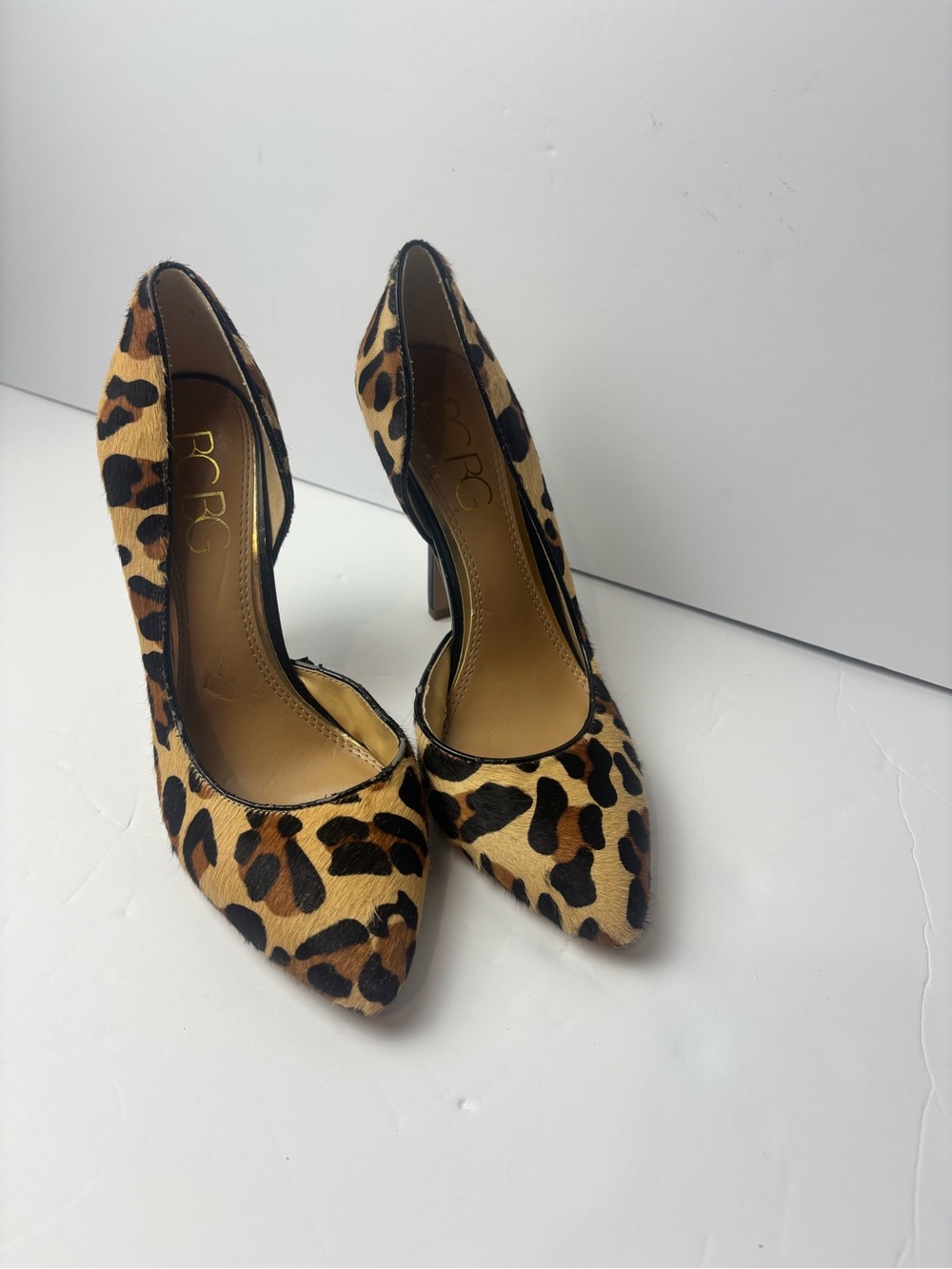 BCBG Leopard Print Real Cow Fur Pointed Toe Pumps in Tan and Black